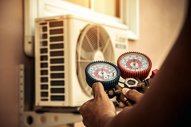 Professional Air Conditioning Service technician working in Waterloo, WI
